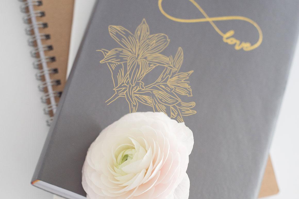 Notebook with foil embossed flower on cover
