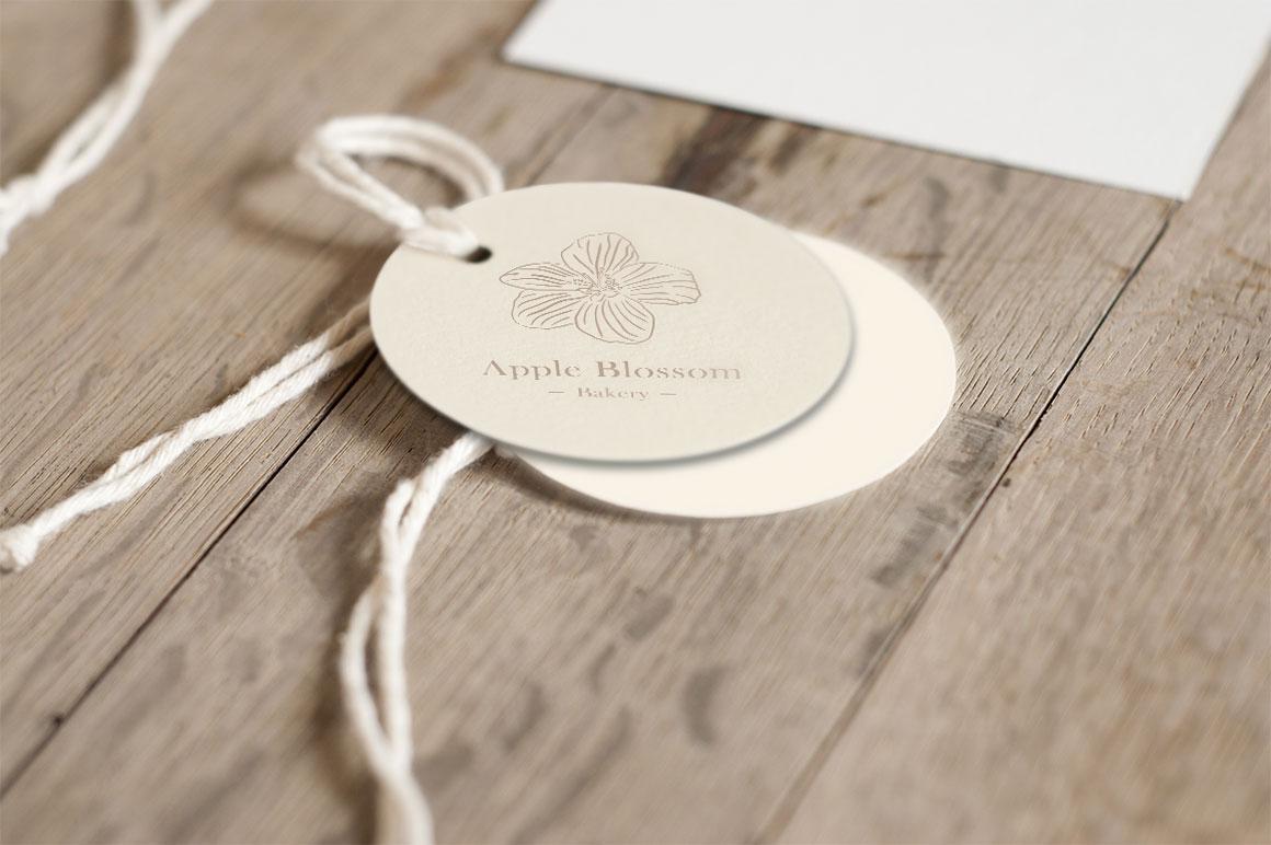 Apple Blossom Bakery shop tag using floral illustration