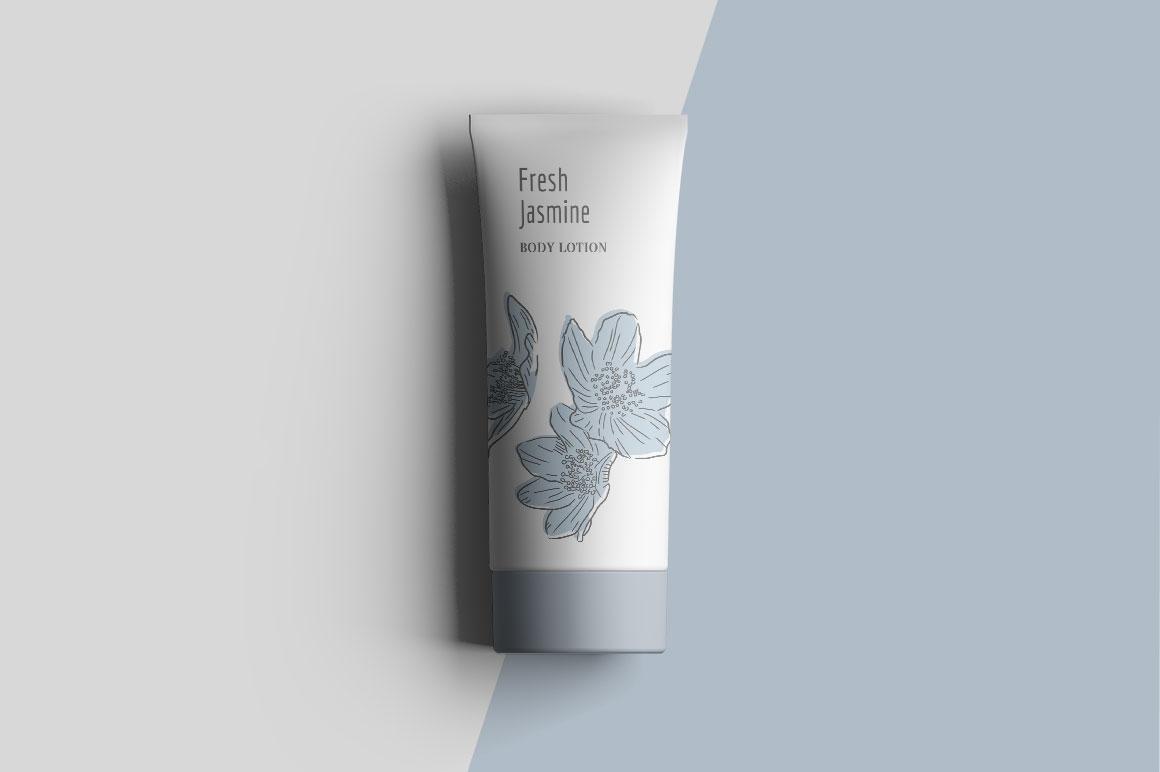 Bottle of body lotion with floral illustrations