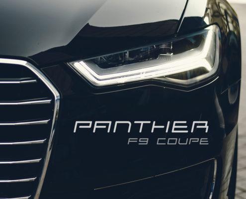 Dark luxury car exterior and headlight with Solia Sans display font overlayed