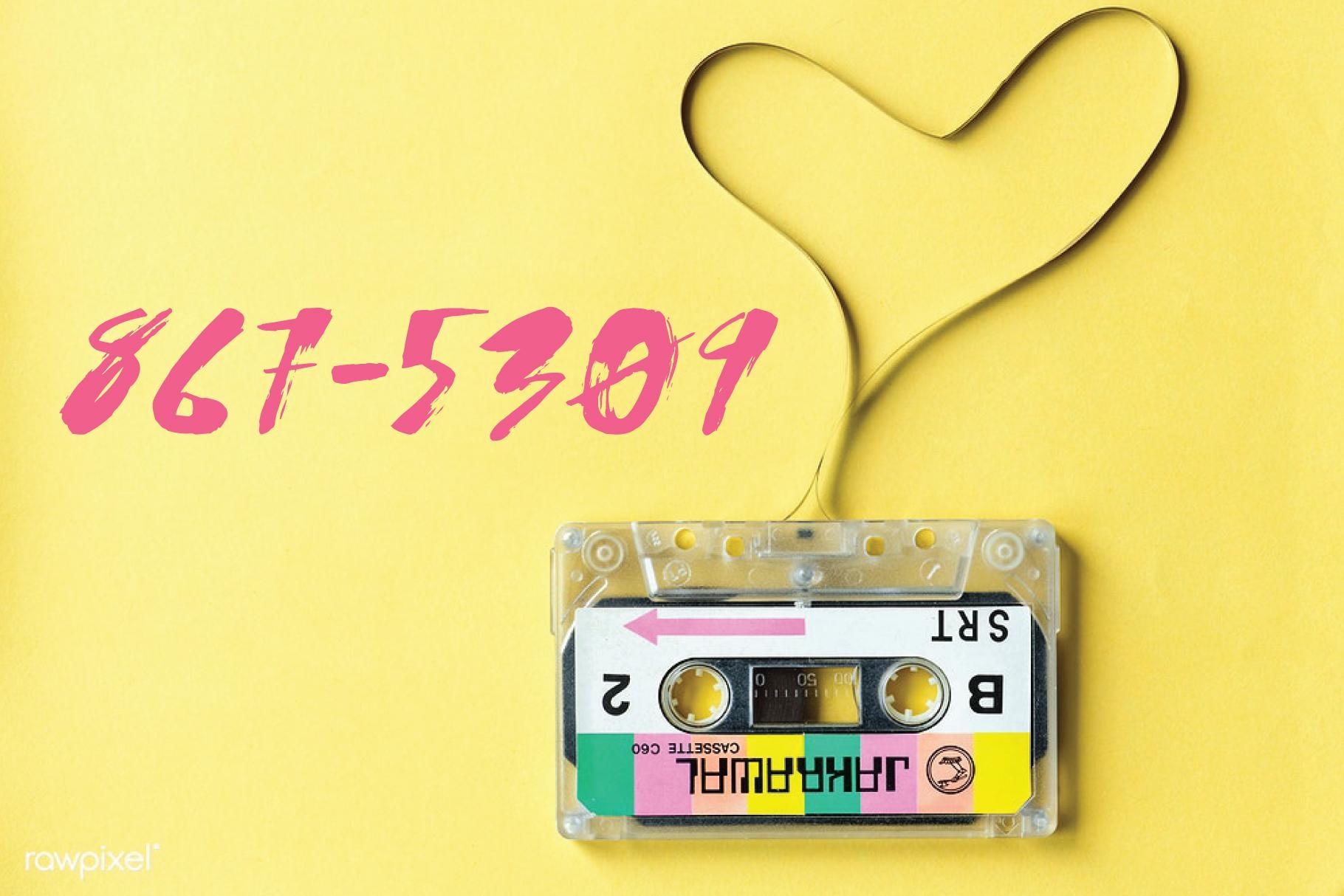 867-5309 next to unspooled tape cassette